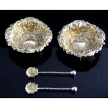 Pair of hallmarked silver gilt Rococo repousse decorated salts together with spoons,