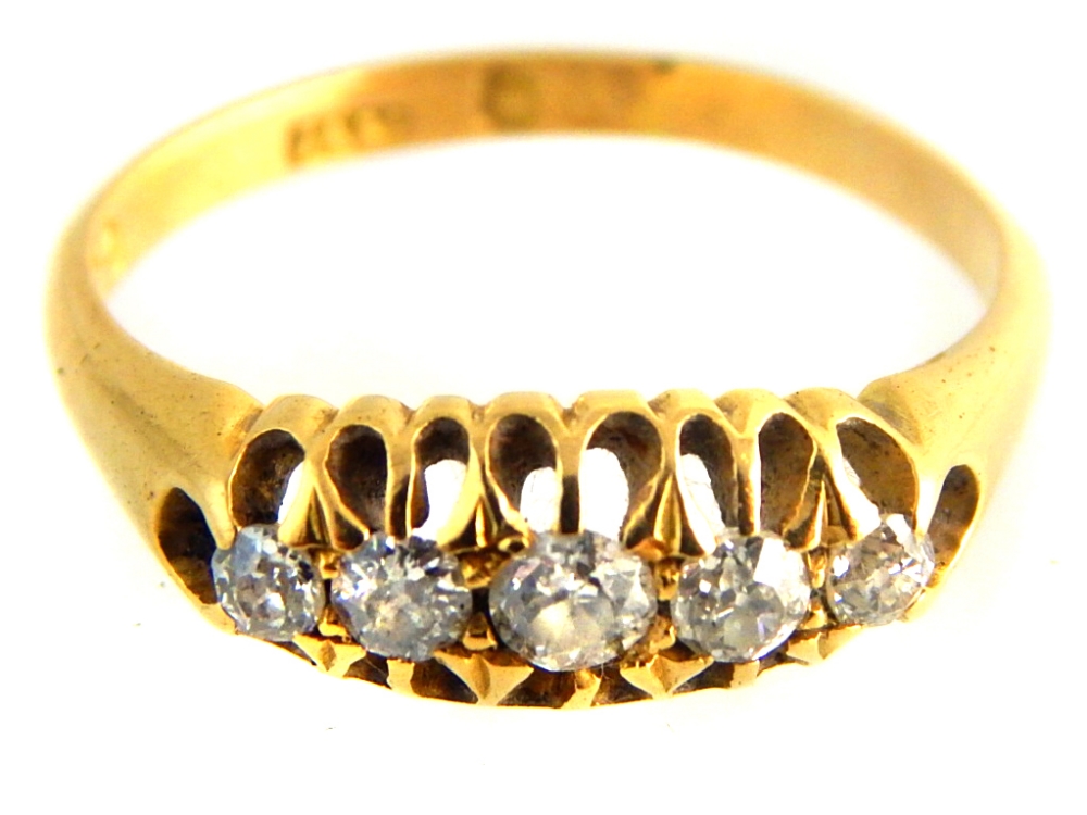 Diamond set five stone ring, in an 18ct gold band, 3.