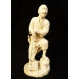 Fine 19th C Japanese carved ivory okimono of a woodsman leaning on his axe, signed to base, 20.