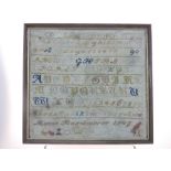 Mid 19th C sampler by Marie Kaemmerer, 1849, decorated with the alphabet, numbers, birds,