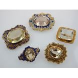 Good collection of five various gold and enamelled framed brooches,