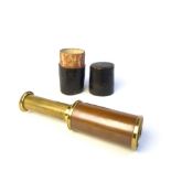 Brass single drawer pocket telescope in leather mounted cylindrical card case