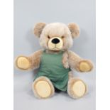 Large Steiff 'Bobby' teddy bear with green apron,