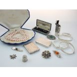 Quantity of brooches, silver bangles and white metal items, to include two vesta cases,