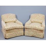 Pair of 20th C Howard design easy armchairs, floral upholstery,