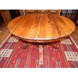 20th century walnut circular extending breakfast table,