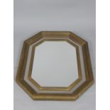 Italian style octagonal brass edged mirror, punch star decoration to border and inner beading,