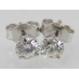 Pair of 18ct white gold diamond ear studs, total weight 1ct,