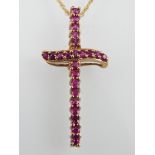 9ct yellow gold and ruby cross pendant,