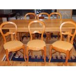 Oak plank top table, with square and turned column legs joined by an H-shaped stretcher,