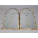 Pair of cream metal Gothic style arched rectangular wall mirrors,