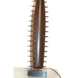 Contemporary bronzed table lamp by Porta Romana, the support modelled as a sawfish rostrum,