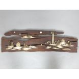 Chinese carved stained bone and driftwood panel depicting a river landscape with waterfall 92cm L