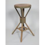 Evertaut Industrial stool, cast metal supports and outswept legs,