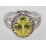 Silver cubic zirconia and yellow stone dress ring