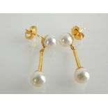 Pair of yellow gold Japanese pearl ear studs