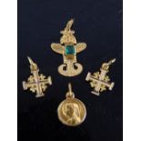 Four gold charms; two crosses, St Christopher and Mexican, Inca figure, 2.2cm h, 3.