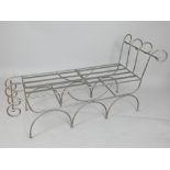 Contemporary wrought steel garden chaise longue, with scroll ends and a slatted seat,