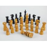 Early 20th C carved and turned boxwood and ebony chess set