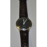 A gentleman's Sandoz wristwatch, with subsidiary date aperture at twelve,