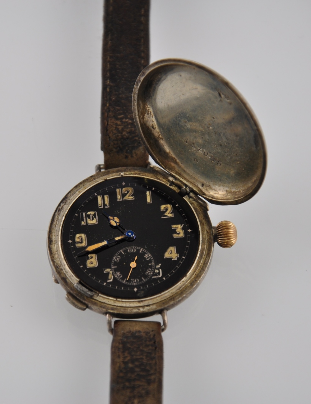An early 20th century silver cased 'hunter' wristwatch,