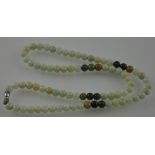 A light and dark jade bead necklace