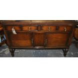 A 1920's oak 2 drawer 2 door sideboard, W.