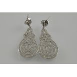 A pair of silver and cubic zirconia drop earrings