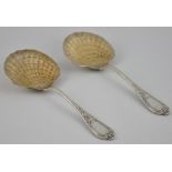 A pair of 19th Century Austrian silver gilt scallop shell serving spoons,