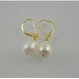A pair of natural pearl drop earrings with 14ct gold mounts