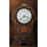 A late Victorian Art Nouveau oak mantle time piece with copper and brass inlaid decoration,