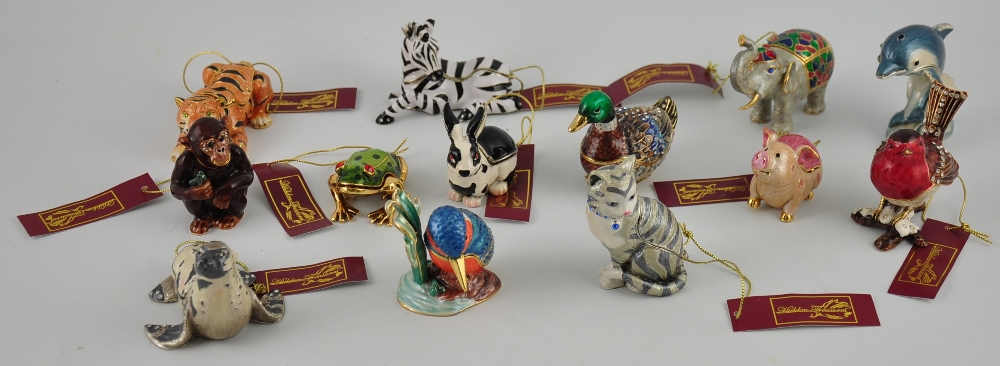 Twelve 'Hidden Treasures' hand-cast enamelled and jewelled pewter collectible boxes by Arora Design,