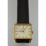 A gold plated square cased Omega automatic wristwatch,