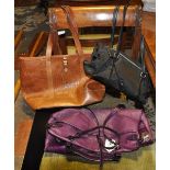 A ladies' purple leather handbag with Mulberry tags and lining,