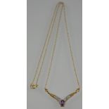 A 9ct amethyst and diamond necklace