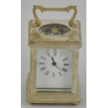 A silver plated carriage clock with key,