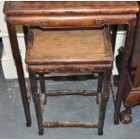 A nest of two Chinese rectangular carved hardwood tea tables