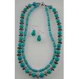 A turquoise coloured and white metal necklace and a matching earring set marked 925