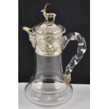 A Victorian silver mounted claret jug of Scottish interest with opposing Highland scenes depicting