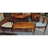 An Edwardian mahogany elbow chair together with an Edwardian tub frame salon chair and a