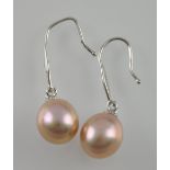 A pair of natural pink drop pearl earrings with 14ct white gold mounts