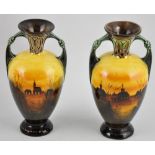 A near-pair of Continental Art Nouveau glazed ceramic twin handled vases,