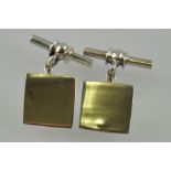 A set of silver plain square cufflinks with chain and bar fitting