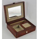 A leather cased fitted jewellery box