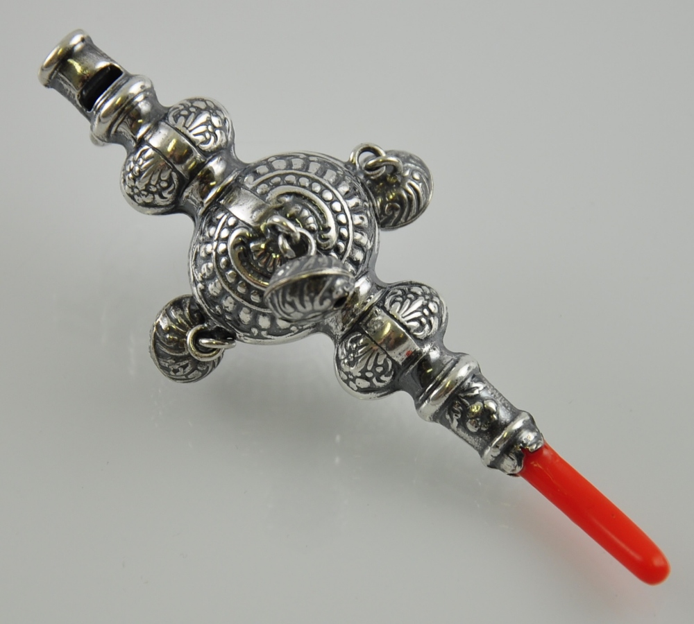 A Continental silver babies rattle