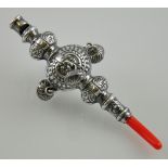 A Continental silver babies rattle