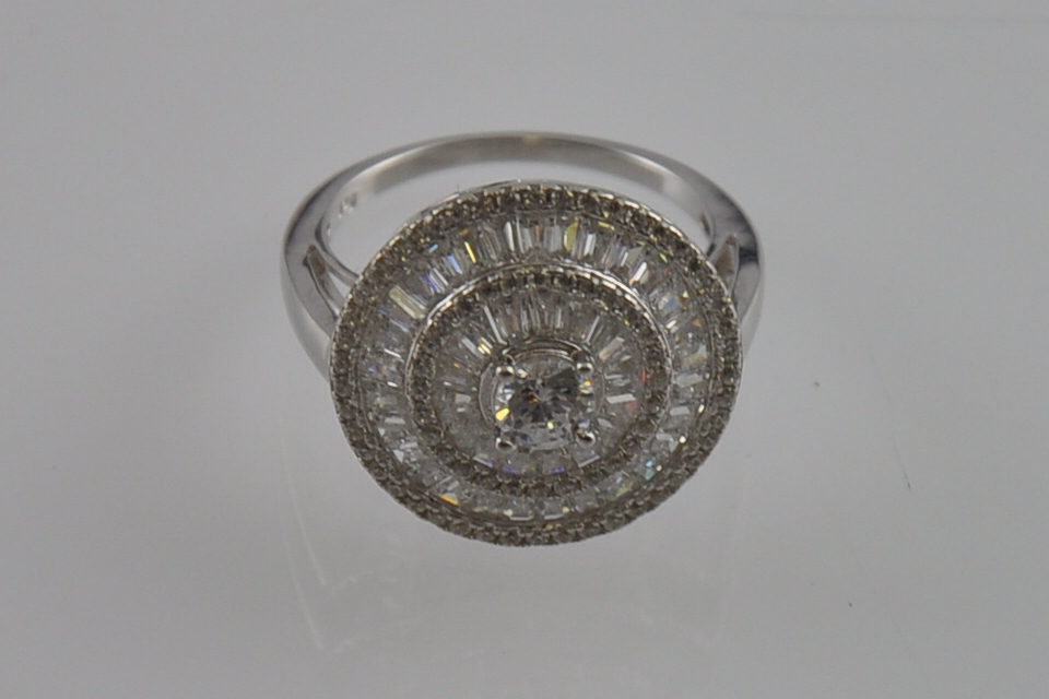 A silver and cubic zirconia dress ring