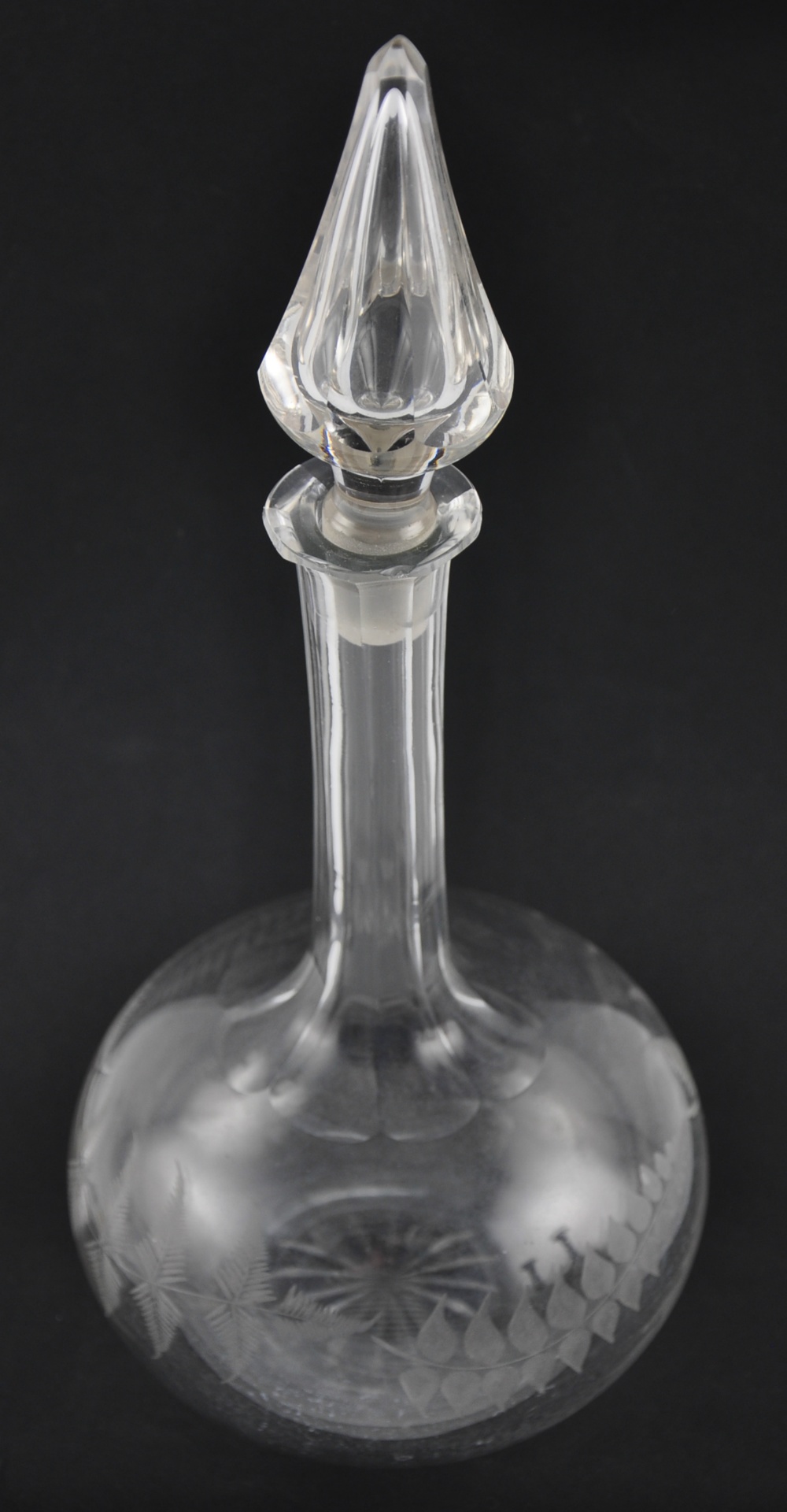 A late Victorian mallet shaped glass decanter with steeple stopper and fern etched body,