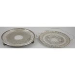 A large silver plated cake plate with handle and bright cut decoration together with a silver