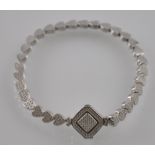 A silver and cubic zirconia bracelet